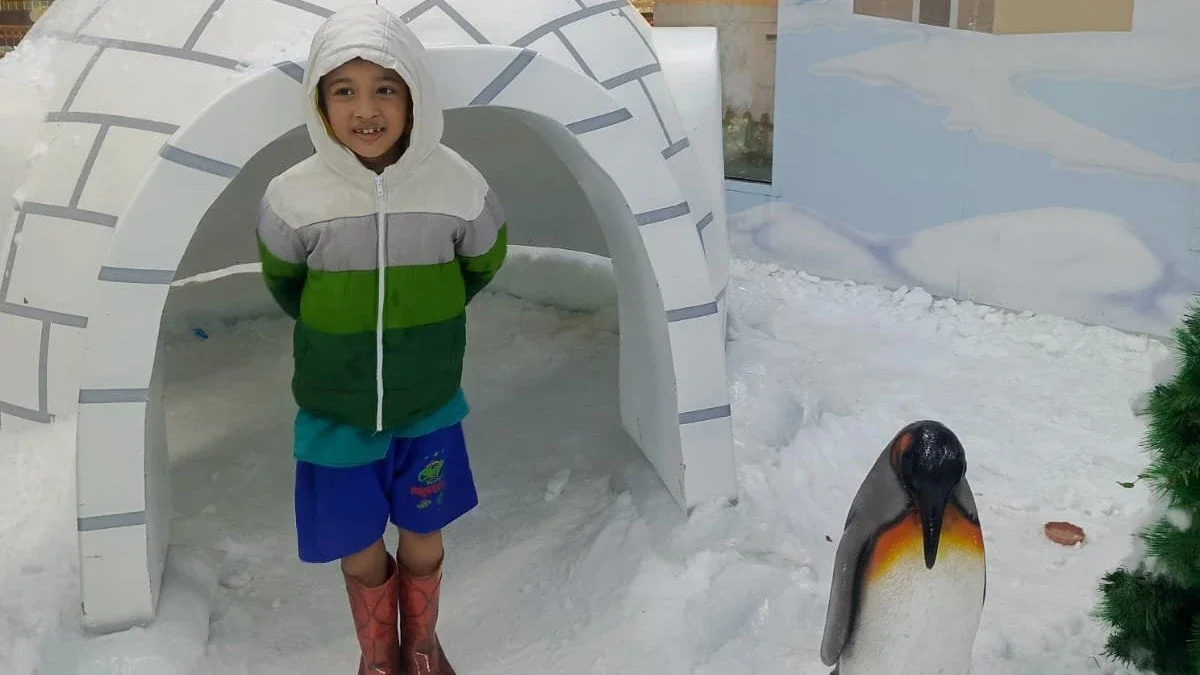 bermain di snow world