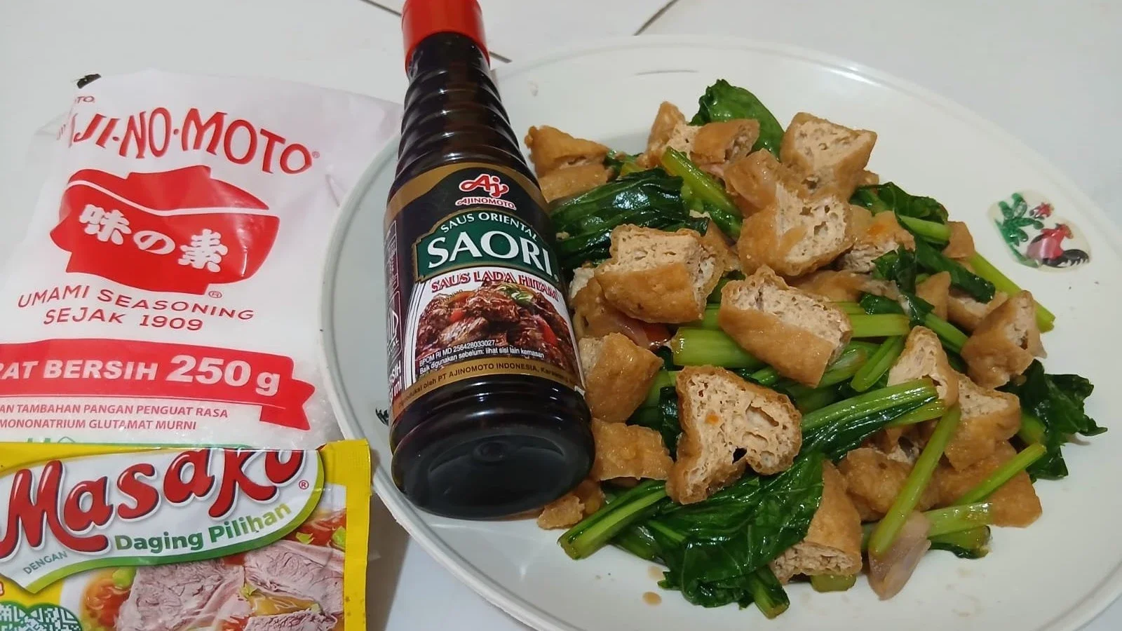 Oseng sawi tahu with Saori saus lada hitam 