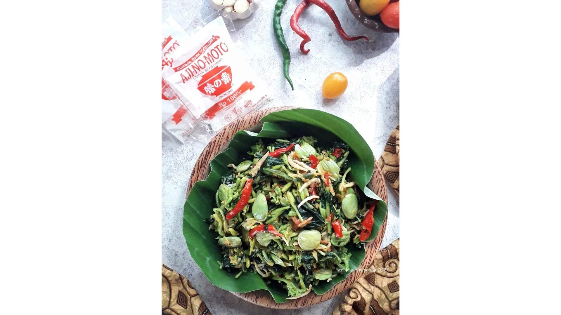 Tumis daun dan bunga pepaya 